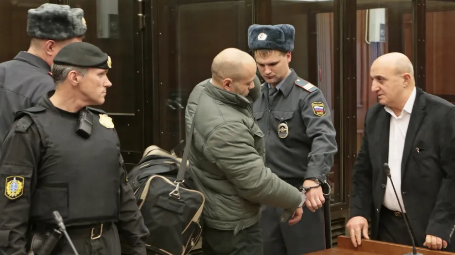 Dmitrij Pavljučenkov před soudem
