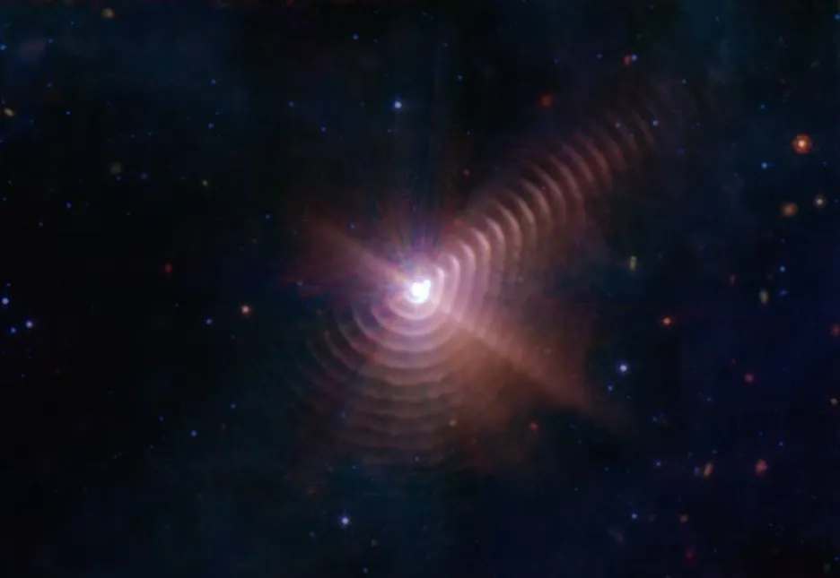 Prachové prstence dvojhvězdy WR 140 na snímku Webbova teleskopu