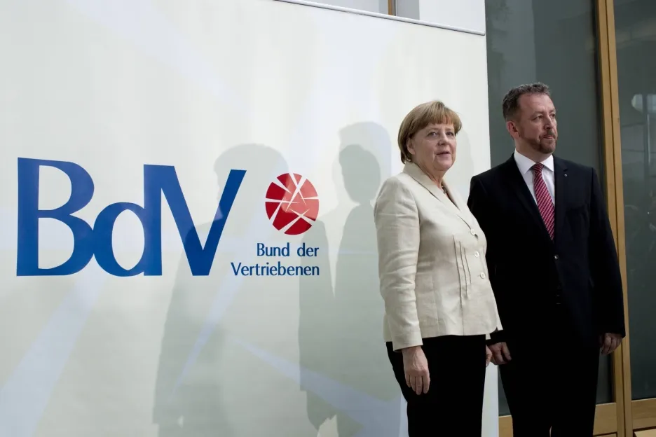 Německá kancléřka a předseda BdV Bernd Fabritius