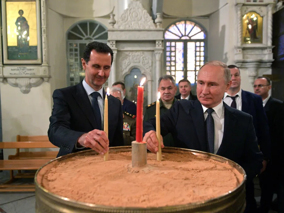 Syrský prezident Bašár Asad a ruský prezident Vladimir Putin v damašské katedrále